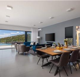 Luxury Beachfront Villa with Heated Infinity Pool near Trogir, Sleeps 8